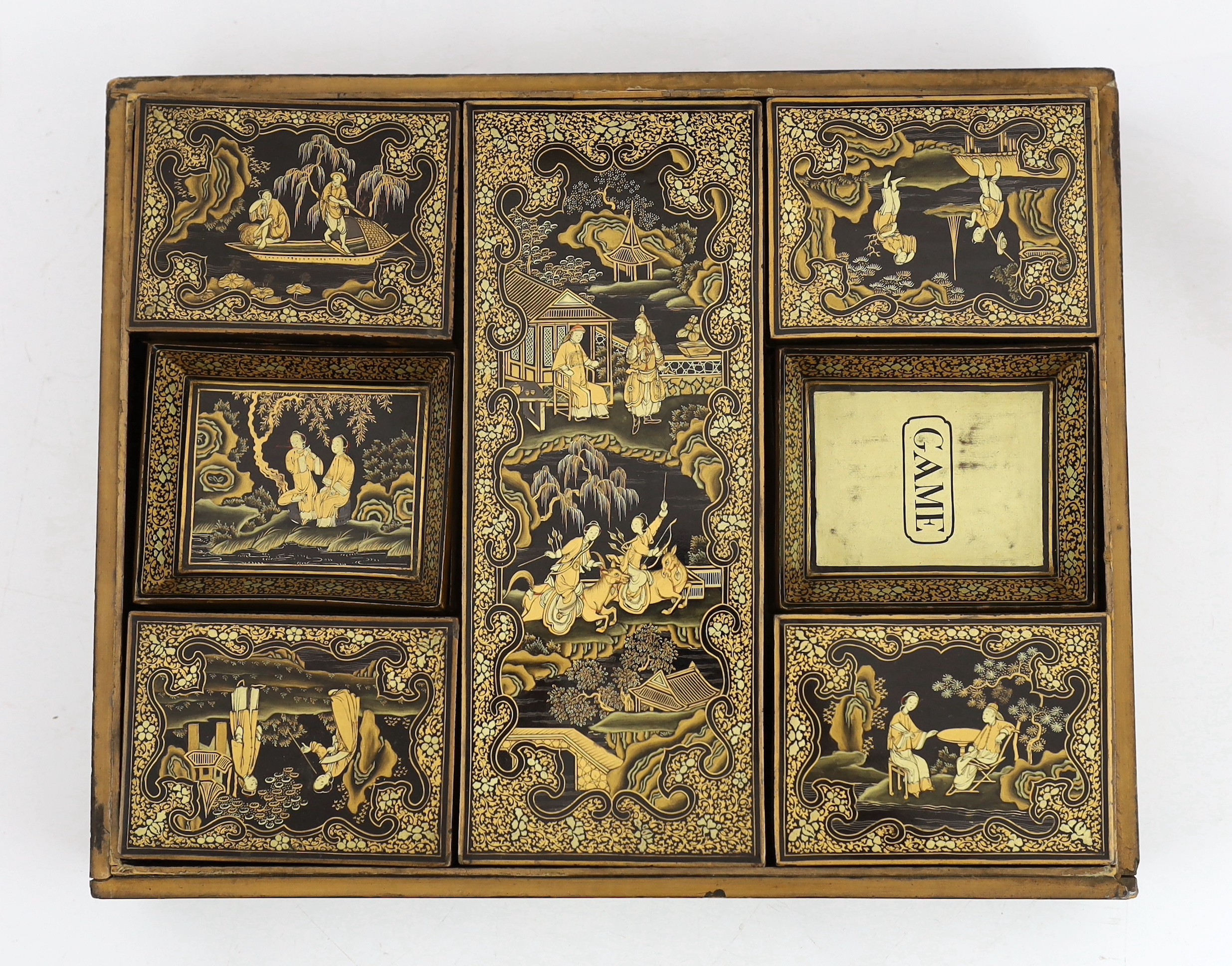 A Chinese gilt-decorated black lacquer games box, mid 19th century
